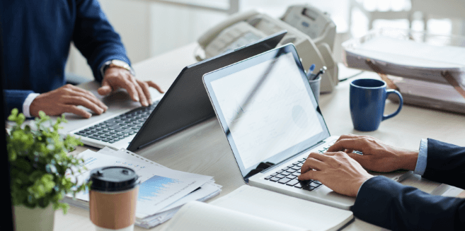 side-view-cropped-unrecognizable-business-people-working-common-desk